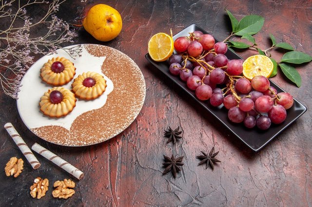 top-view-yummy-little-cookies-with-grapes-dark-table-cake-sweet-biscuit-sugar_140725-81836.jpg