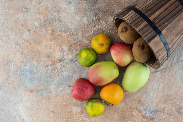 wooden-basket-with-fresh-sweet-fruits-gray-table_114579-22228.jpg