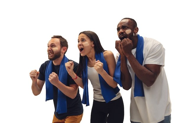 Free photo togetherness. multiethnic soccer fans cheering for favorite team with bright emotions isolated on white background.