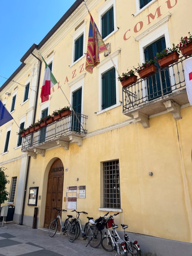 This is the mayors house the palazzo municipale , I love the flags waving as a welcome.