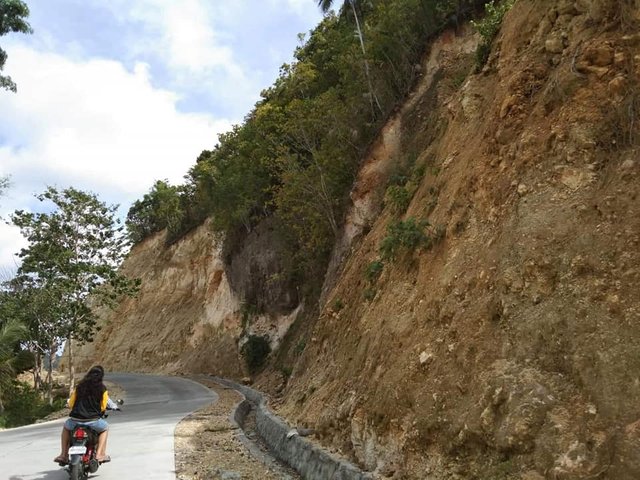 The Start. Actually, before the construction of the road, it is not easy to access this road and we are thankful to our provincial government because they established this road to access to there respected Barangays. Anyway, just take a look who is the first bike showed haha the person that always nagging/who quorum this journey no other than my office mate and friend Joanna. 