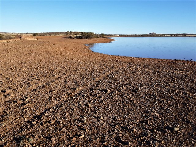 Ever-receding dam supply on this remote farm