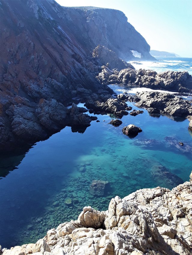 See how steep the cliffs are that border this shoreline