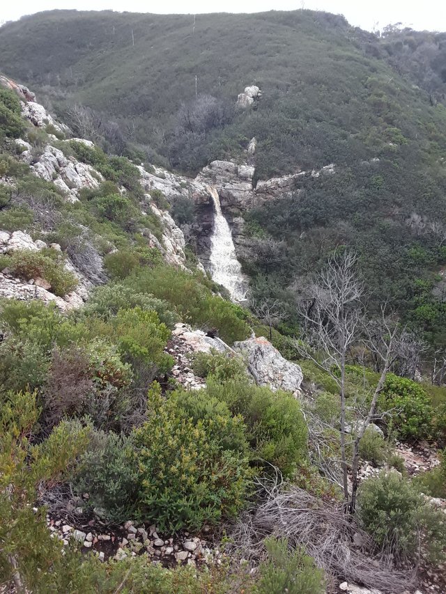 Upper waterfall before it reaches the second layer of falls at the final cliff edge
