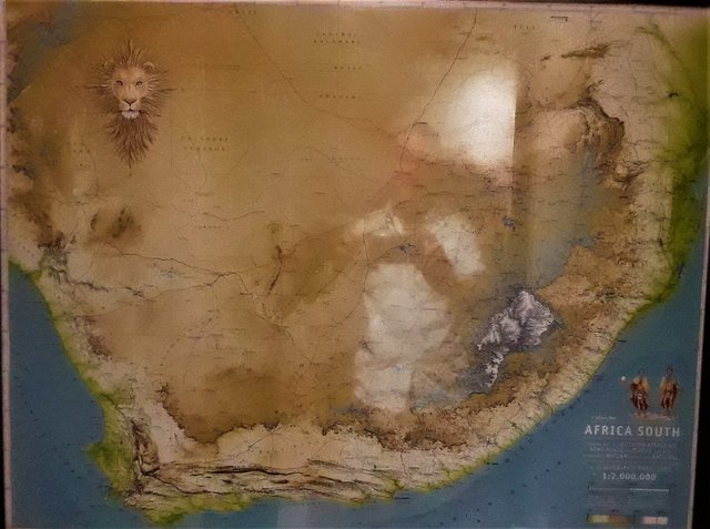 An old map of this area framed and behind glass on the wall. I’m on the lower coast, in the middle region