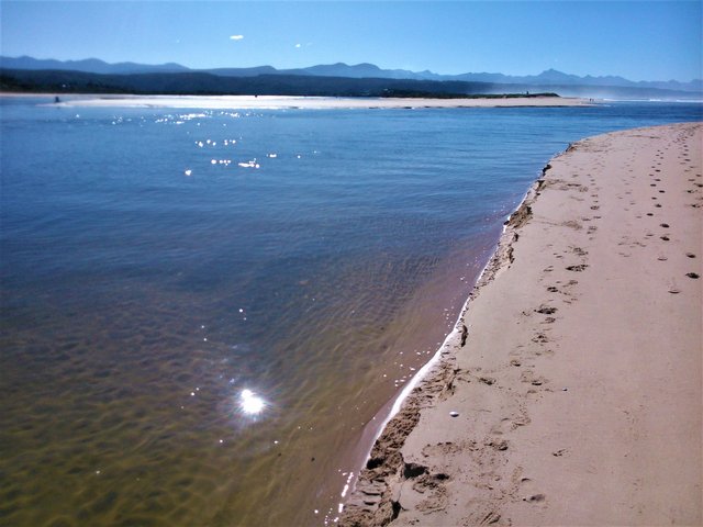 The lagoon mouth as the it flows out to the Indian ocean at Lookout beach