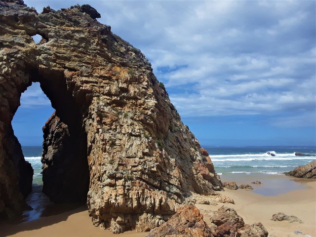 A magical natural geological feature - Arch Rock - with curious circle window up top above the arch