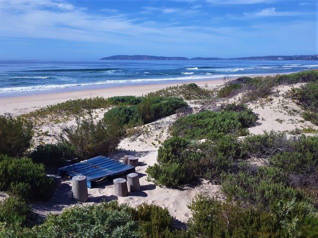 A wide view of Robberg peninsula in the background, from the dunes on Keurbooms beach.