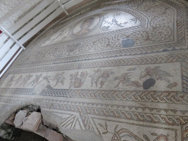 Mosaic of scenes of a legionary.