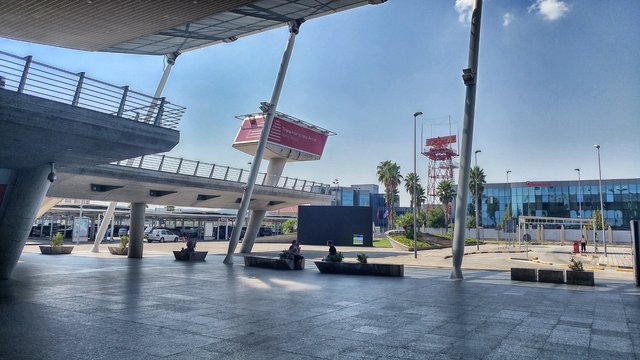 A wide open place in front of the modern airport