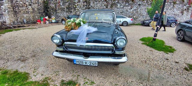 EWedding party with an old russian Wolga car