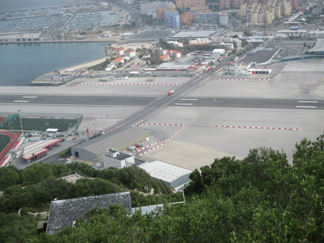 The airport can also be seen from The Rock. The airport has only one runway and when it is not in use, public vehicles can actually drive across the runway. This is possible as there are only one or two flights per day to Gibraltar.