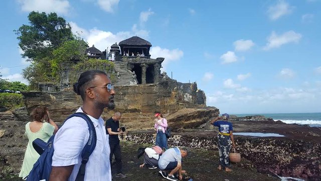 There was a ceremony going on that day. You can see people in costumes on top of the temple. However the temple is closed off to tourists. 