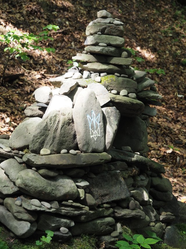 Someone carved a trident on one of the stones