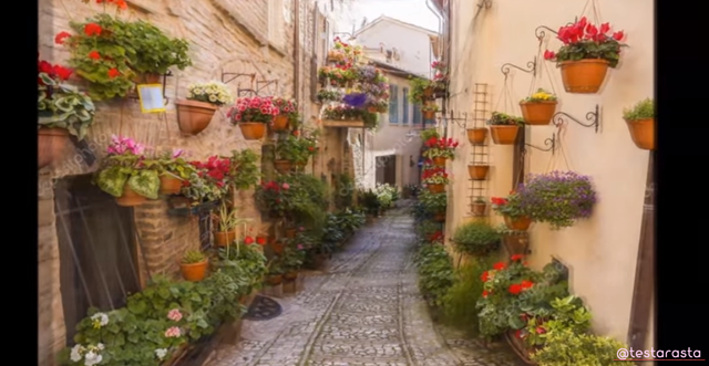 Spello street with the characteristic floral decorations.