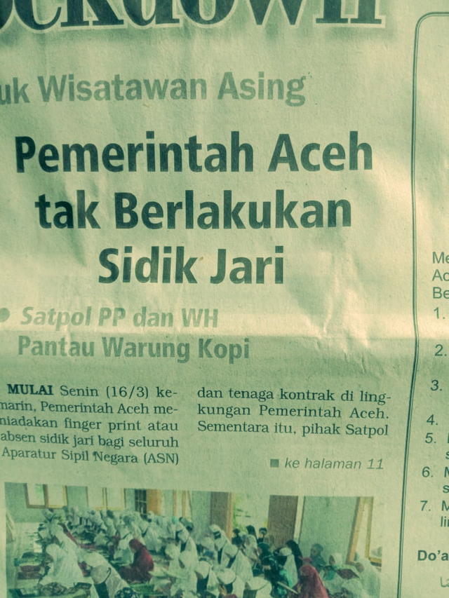 Image Photo of local newspaper when the Aceh government began instructing its staff to also stop fingerprinting.