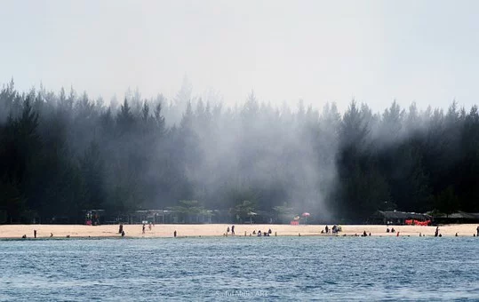 Pictures of Lampuuk Beach, white sand from a distance and turquoise blue sea water