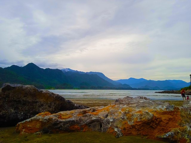 Sea, hills, and rocks