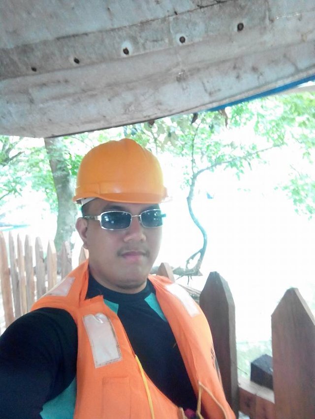 This is me wearing a life jacket and helmet (protection from bat urine)