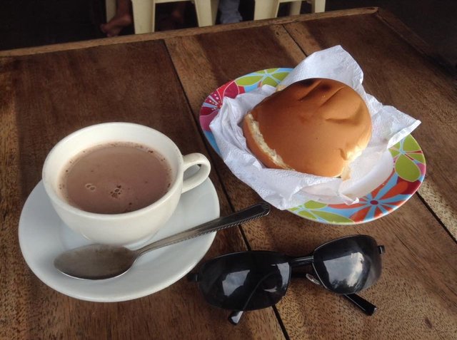 Quick snack with a bun and instant coffee