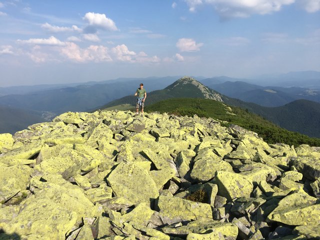 There are many stones on the top of the mountain