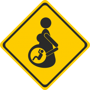Yellow warning sign depicting a pregnant woman.