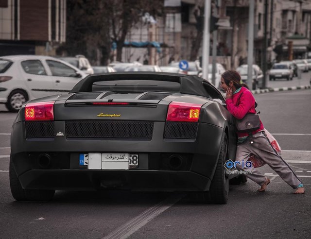 Lamborghini and a Poor Barefoot Girl