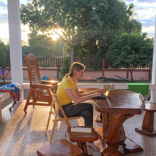 Daniel hacking on a porch in rural Thailand