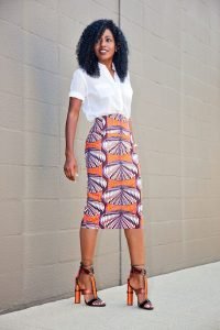 Trendy ways to style a white shirt .Safari style white shirt on a pencil skirt