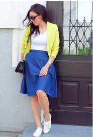 ways to style a white shirt .A body fitted white shirt with blazers tucked into a flair skirt and a flat white shoe