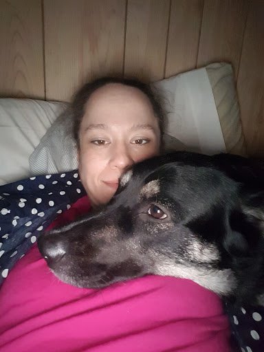 my dog and I snuggled in bed