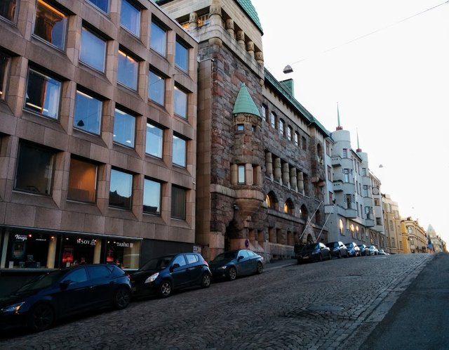 A steep street with beautiful houses