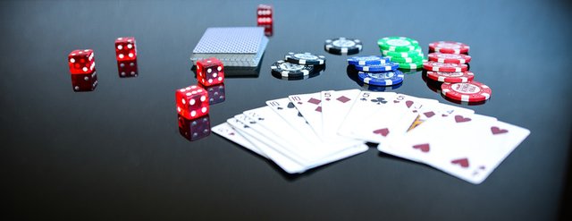 https://www.canva.com/photos/business-finance/MACWPlPpB2c-poker-game-play-gambling-luck-lucky-dice-craps/?query=gambling