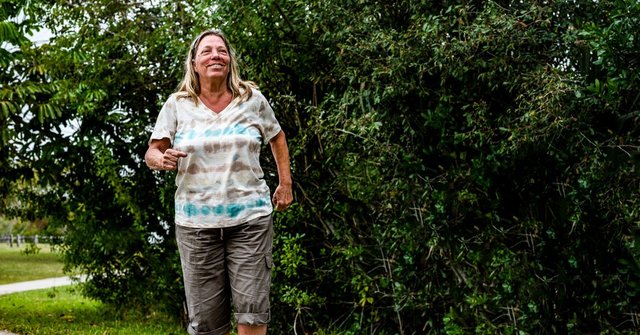 Elderly woman walking outdoors