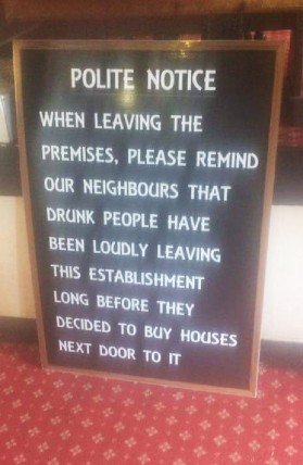 Image of pub sign polite notice