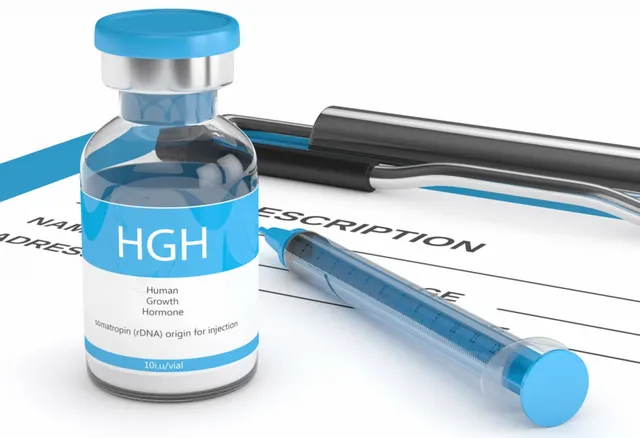 HGH vial and syringe on medical chart