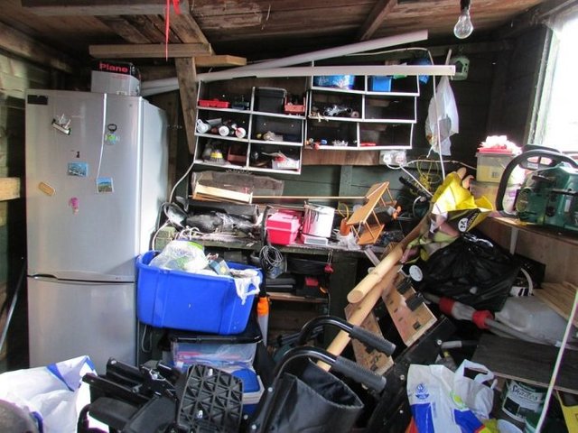 A garage that needs to be rid of clutter