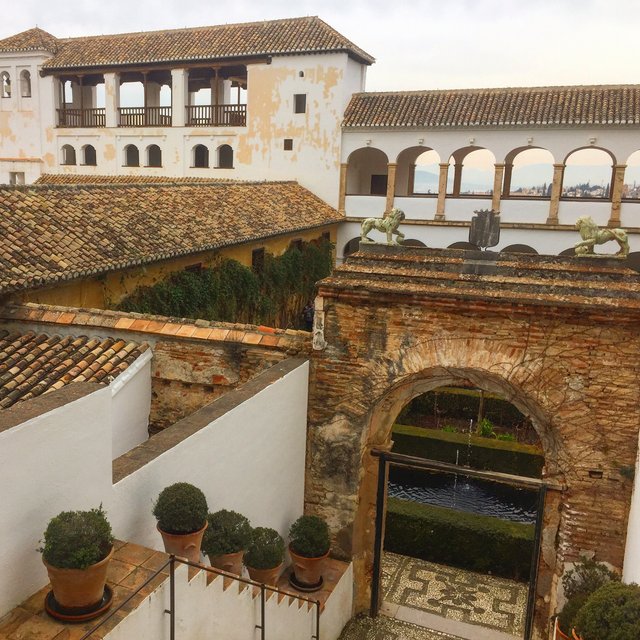 Courtyards within the new palace feature more modern, Spanish style architecture. 