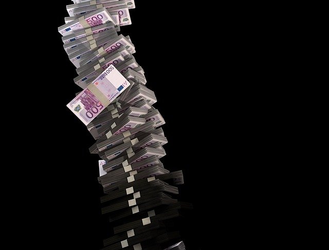 A jenga tower of money.jpg