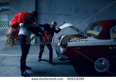 stock-photo-two-kidnapping-men-abductions-a-young-long-haired-blonde-woman-holding-her-on-the-shoulder-and-688216165.jpg