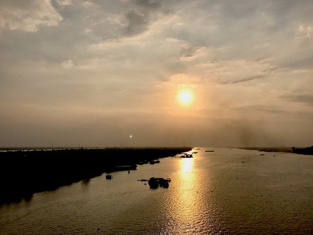 sunset my tho to Bentre bridge.jpg