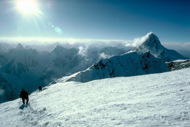 Climbers on Broad Peak Ridge K2 in Background.jpg