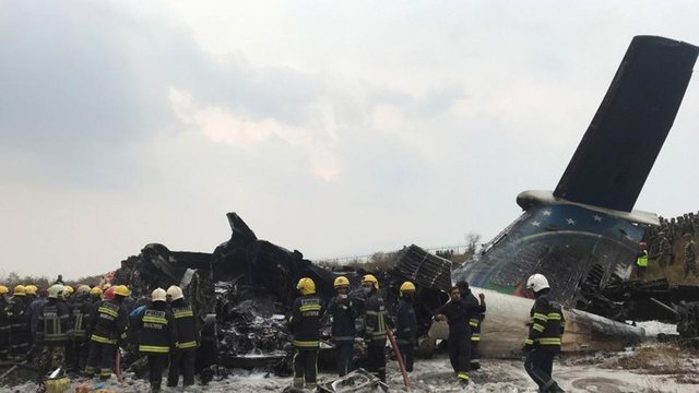 wreckage-airport-workers-airplane-operate-pictured-kathmandu_7e4b2f20-25e6-11e8-9f95-06a811d7e716.jpg