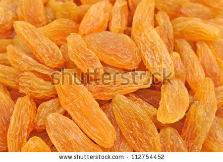 stock-photo-close-up-pile-of-dried-raisins-112754452.jpg