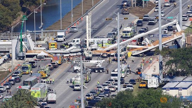 aerial-view-shows-a-pedestrian-bridge-collapsed-at-florida-international-university-in-miami-7.jpg