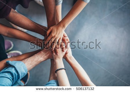 stock-photo-close-up-top-view-of-young-people-putting-their-hands-together-friends-with-stack-of-hands-showing-506137132.jpg