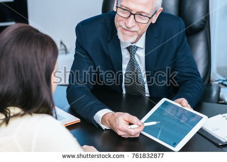 stock-photo-consultant-advising-young-woman-at-office-761832877.jpg