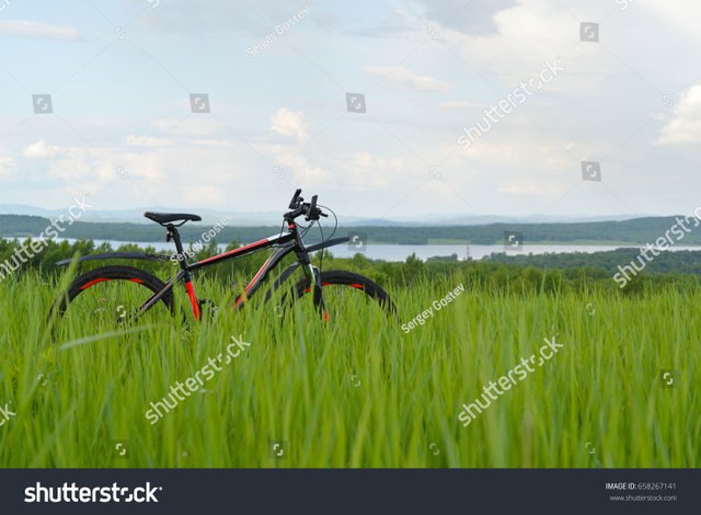 stock-photo-bike-in-the-nature-658267141.jpg