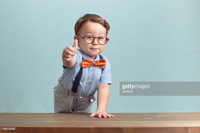 portrait-of-happy-little-boy-giving-you-thumbs-up-picture-id469753498.jpeg