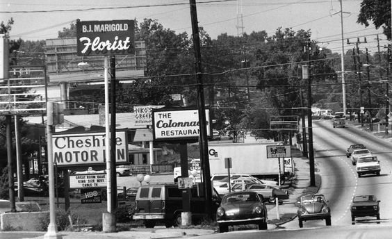 A portion of Cheshire Bridge Road, looking towards Piedmont Road. Included are The Colonnade, Niko's, Cheshire Motor Inn, Marigold florist. The photo was taken September 1, 1984. (Cheryl Bray/AJC staff)